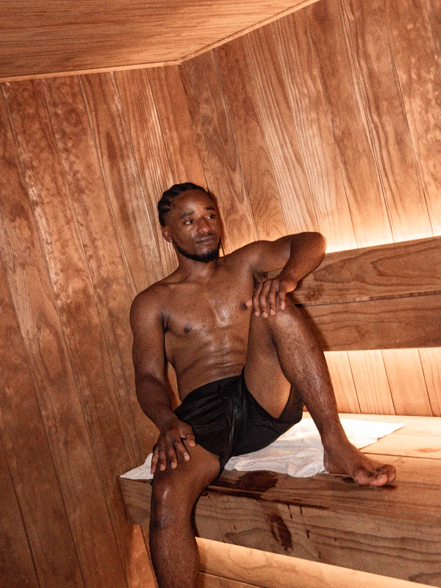 A member relaxing in the Finnish sauna at Pulse Club Fulham