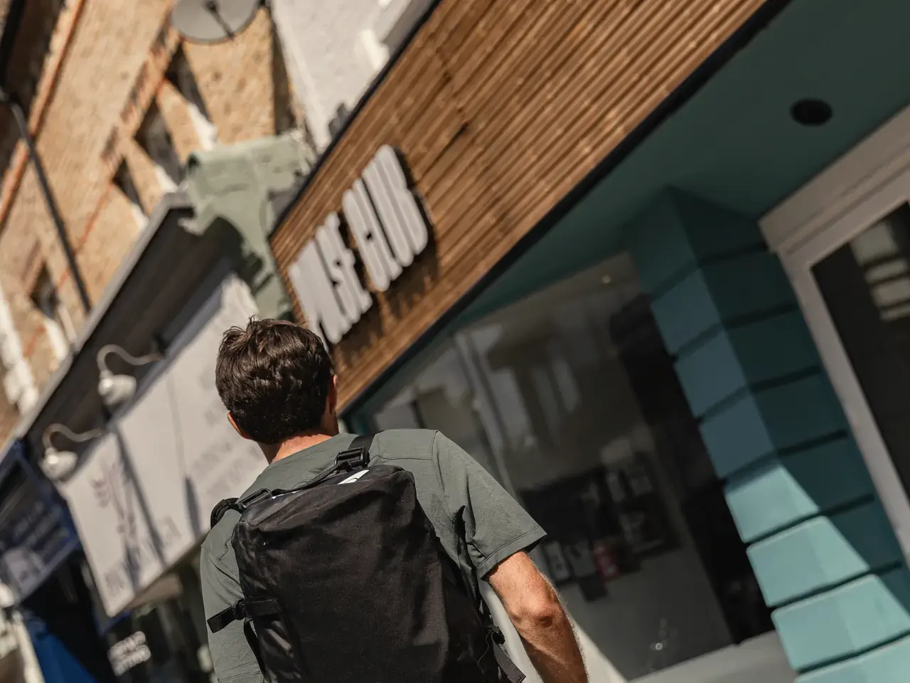 A member walking into Pulse Club Putney on Upper Richmond Road